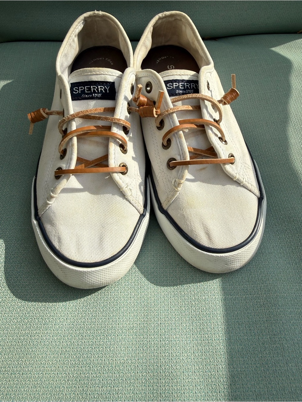 Sperry Top Siders. 7.5 white with the black trim.  Leather ties gently loved.